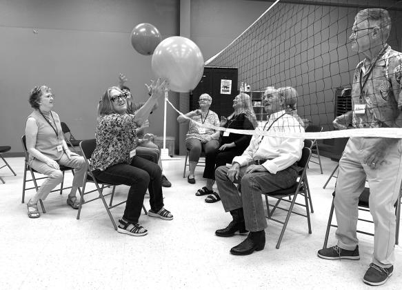 The caregiver gets a break by leaving off their loved one with us for a 4-hour session that includes snacks, crafts or a program based on a theme, chair exercise, balloon volleyball, games, lunch and music. File photo